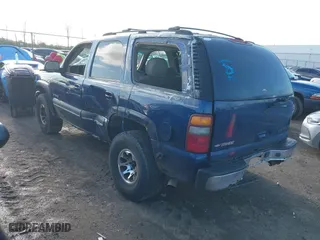 2002 Chevrolet Tahoe LT with VIN 1GNEK13Z42J140816, listed as a IAAI auction lot 41973686 with 241,722 mi miles. Bid and sale history available at carsss.com. Image 3.
