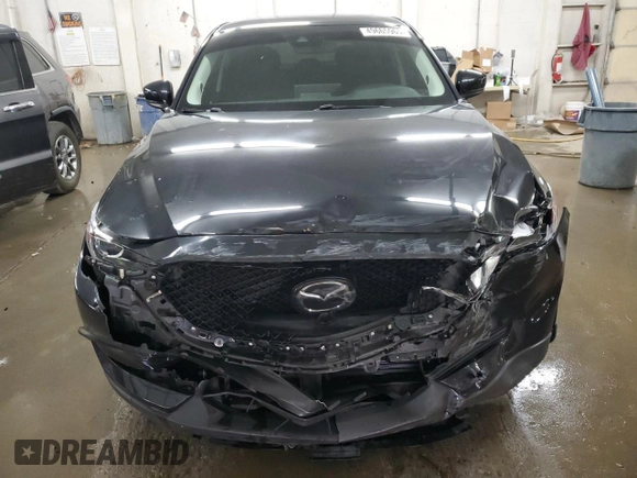 2021 Mazda CX-5 Touring with VIN JM3KFACM5M1347827, listed as a Copart auction lot 49665965 with 46,636 mi miles and Salvage Title. Bid and sale history available at carsss.com. Image 5.