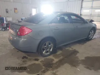 2009 Pontiac G6 1SB with VIN 1G2ZJ57B894237824, listed as a IAAI auction lot 41731113 with 144,914 mi miles and . Bid and sale history available at DreamBid. Image 4.