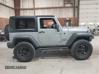 2014 Jeep Wrangler Sport with VIN 1C4AJWAG0EL173362, listed as a IAAI auction lot 42231863 with 99,321 mi miles and . Bid and sale history available at DreamBid. Image 13.