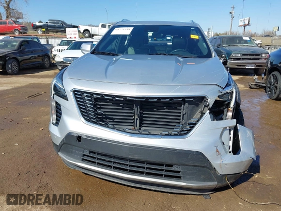 2019 Cadillac XT4 FWD Premium Luxury with VIN 1GYFZCR47KF110481, listed as a IAAI auction lot 41771338 with 103,124 mi miles. Bid and sale history available at carsss.com. Image 13.