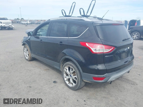 2013 Ford Escape Titanium z VIN 1FMCU0J90DUB32703, wystawiony jako IAAI lot #41714424 z przebiegiem 127 639 mil mil oraz . Historia ofert i sprzedaży dostępna na DreamBid. Obrazek 3.