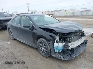 2021 Toyota Camry SE Nightshade with VIN 4T1G11AK4MU573284, listed as a IAAI auction lot 41701923 with 130,160 mi miles. Bid and sale history available at carsss.com. Image 1.