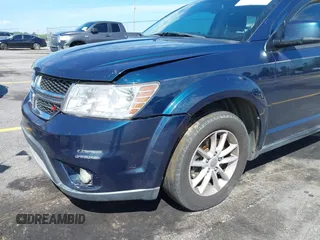 2014 Dodge Journey SXT z VIN 3C4PDDBG8ET193254, wystawiony jako IAAI lot #42146303 z przebiegiem 270 000 mil mil oraz . Historia ofert i sprzedaży dostępna na DreamBid. Obrazek 6.