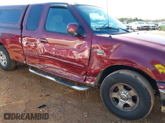 2003 Ford F-150 XL with VIN 1FTRX17W43NA07186, listed as a IAAI auction lot 41864354 with 123,565 mi miles. Bid and sale history available at carsss.com. Image 6.