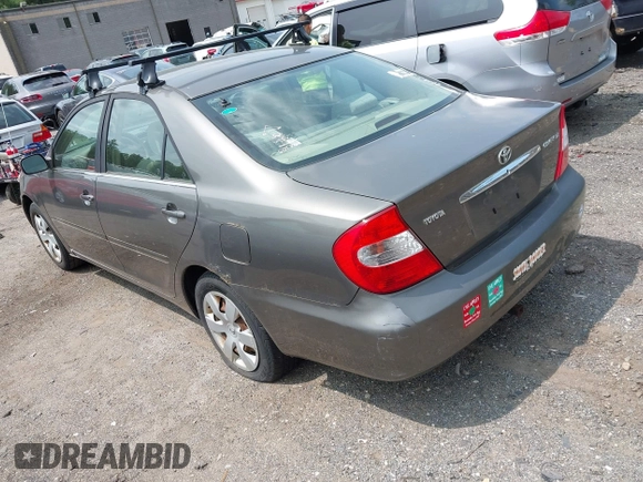 2002 Toyota Camry LE z VIN JTDBE32KX20070778, wystawiony jako IAAI lot #42389584 z przebiegiem 278 070 mil mil oraz . Historia ofert i sprzedaży dostępna na DreamBid. Obrazek 3.