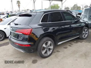 2023 Audi Q5 Premium Plus z VIN WA1BBAFY7P2187588, wystawiony jako IAAI lot #42052046 z przebiegiem 18 987 mil mil oraz . Historia ofert i sprzedaży dostępna na DreamBid. Obrazek 4.