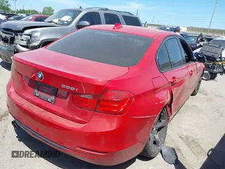 2012 BMW 3 Series 328i with VIN WBA3A5C57CFJ89565, listed as a IAAI auction lot 39130127 with 76,917 mi miles. Bid and sale history available at carsss.com. Image 4.