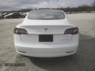 2020 Tesla Model 3 Long Range with VIN 5YJ3E1EBXLF636977, listed as a Copart auction lot 49852305 with 65,236 mi miles and Salvage Title. Bid and sale history available at carsss.com. Image 6.