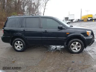 2006 Honda Pilot EX with VIN 2HKYF18486H527682, listed as a IAAI auction lot 41941295 with 235,521 mi miles. Bid and sale history available at carsss.com. Image 13.