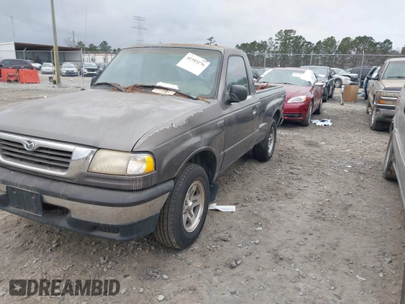 2000 Mazda B-Series Truck SX with VIN 4F4YR12C9YTM23599, listed as a IAAI auction lot 41393276 with 232,789 mi miles and . Bid and sale history available at DreamBid. Image 2.