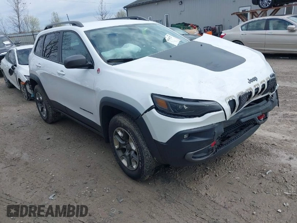 2019 Jeep Cherokee Trailhawk Elite with VIN 1C4PJMBX4KD351261, listed as a IAAI auction lot 41944727 with 97,849 mi miles. Bid and sale history available at carsss.com. Image 1.