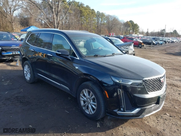 2023 Cadillac XT6 Luxury with VIN 1GYKPBR41PZ136918, listed as a IAAI auction lot 41417724 with 57,949 mi miles. Bid and sale history available at carsss.com. Image 13.
