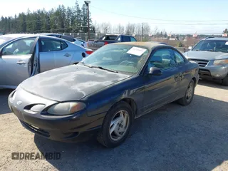 2000 Ford Escort ZX2 with VIN 3FAKP1139YR248686, listed as a IAAI auction lot 41721653 with 300,218 mi miles. Bid and sale history available at carsss.com. Image 2.