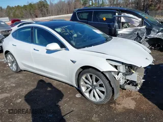 2020 Tesla Model 3 Long Range with VIN 5YJ3E1EB1LF621185, listed as a IAAI auction lot 41375686 with 92,044 mi miles. Bid and sale history available at carsss.com. Image 1.