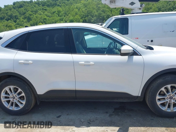 2020 Ford Escape SE z VIN 1FMCU9G63LUA85246, wystawiony jako IAAI lot #42414015 z przebiegiem 54 578 mil mil oraz . Historia ofert i sprzedaży dostępna na DreamBid. Obrazek 14.
