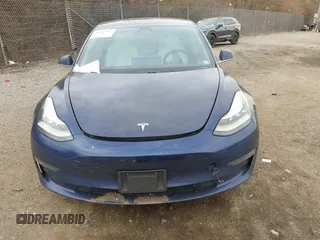 2018 Tesla Model 3 Long Range Battery with VIN 5YJ3E1EB2JF056166, listed as a IAAI auction lot 41847972 with 126,126 mi miles and . Bid and sale history available at DreamBid. Image 13.