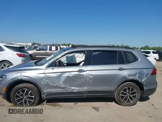 2021 Volkswagen Tiguan SE with VIN 3VV3B7AX0MM026064, listed as a IAAI auction lot 42038137 with 18,526 mi miles and . Bid and sale history available at DreamBid. Image 14.