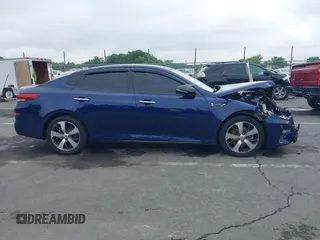 2019 Kia Optima LX z VIN 5XXGT4L31KG328032, wystawiony jako IAAI lot #42208195 z przebiegiem 78 086 mil mil oraz . Historia ofert i sprzedaży dostępna na DreamBid. Obrazek 13.