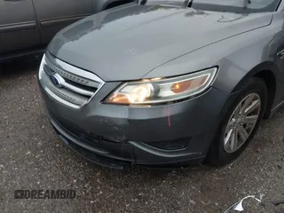 2011 Ford Taurus SE with VIN 1FAHP2DW2BG181059, listed as a IAAI auction lot 42036867 with 103,394 mi miles. Bid and sale history available at carsss.com. Image 6.