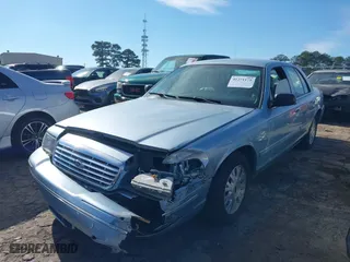 2005 Ford Crown Victoria LX with VIN 2FAFP74W65X135964, listed as a IAAI auction lot 41271175 with 82,494 mi miles. Bid and sale history available at carsss.com. Image 6.