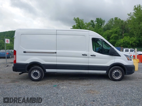 2022 Ford Transit Cargo with VIN 1FTBR1C85NKA74578, listed as a IAAI auction lot 42316744 with 63,376 mi miles and . Bid and sale history available at DreamBid. Image 13.
