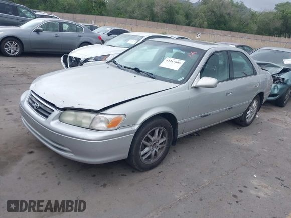2001 Toyota Camry LE z VIN 4T1BF28K71U127407, wystawiony jako IAAI lot #42247606 z przebiegiem 289 995 mil mil oraz . Historia ofert i sprzedaży dostępna na DreamBid. Obrazek 17.