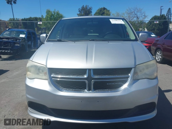 2012 Dodge Grand Caravan SXT with VIN 2C4RDGCG7CR204835, listed as a IAAI auction lot 41948688 with 125,466 mi miles and . Bid and sale history available at DreamBid. Image 12.