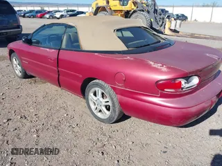 1996 Chrysler Sebring JXi with VIN 3C3EL55H0TT324666, listed as a IAAI auction lot 42102226 with 114,755 mi miles and . Bid and sale history available at DreamBid. Image 3.