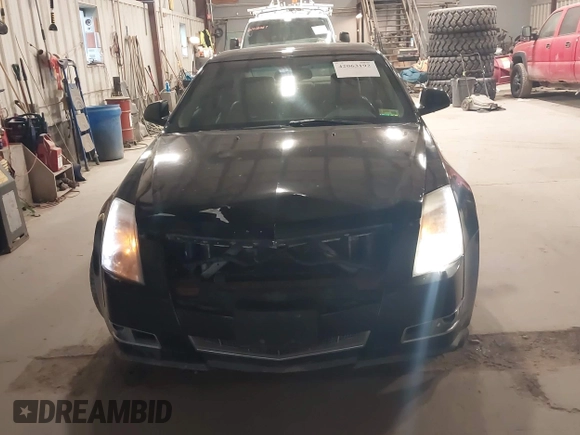 2009 Cadillac CTS AWD w/1SB with VIN 1G6DT57V290152885, listed as a IAAI auction lot 42063192 with 146,119 mi miles. Bid and sale history available at carsss.com. Image 6.