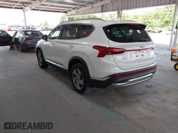 2022 Hyundai Santa Fe SEL z VIN 5NMS24AJ2NH447700, wystawiony jako IAAI lot #42476914 z przebiegiem 59 578 mil mil oraz . Historia ofert i sprzedaży dostępna na DreamBid. Obrazek 3.