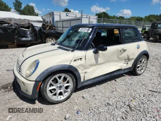 2006 MINI Hardtop S z VIN WMWRE33556TJ38543, wystawiony jako Copart lot #62420145 z przebiegiem 105 656 mil mil oraz Szkoda całkowita • Salvage title. Historia ofert i sprzedaży dostępna na DreamBid. Obrazek 1.