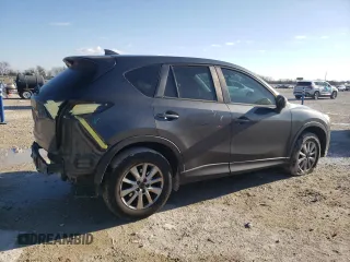 2016 Mazda CX-5 Sport with VIN JM3KE2BE9G0650543, listed as a Copart auction lot 41987795 with 163,528 mi miles and Salvage Title. Bid and sale history available at carsss.com. Image 3.