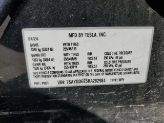 2024 Tesla Model Y Long Range with VIN 7SAYGDEE5RA282984, listed as a Copart auction lot 52388455 with 11,922 mi miles and Salvage Title. Bid and sale history available at DreamBid. Image 14.