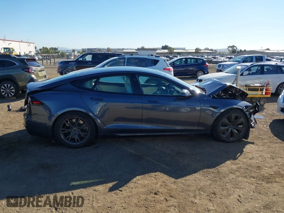 2023 Tesla Model S with VIN 5YJSA1E5XPF500341, listed as a IAAI auction lot 40756406 with 11,583 mi miles and . Bid and sale history available at DreamBid. Image 14.