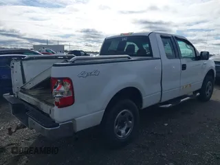 2006 Ford F-150 STX with VIN 1FTRX14W86NB32815, listed as a IAAI auction lot 41909527 with 310,653 mi miles. Bid and sale history available at carsss.com. Image 4.