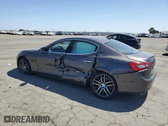 2016 Maserati Ghibli S with VIN ZAM57RSA3G1169053, listed as a Copart auction lot 58970355 with 73,843 mi miles and Salvage title. Bid and sale history available at DreamBid. Image 2.