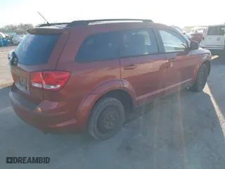2012 Dodge Journey SE with VIN 3C4PDCAB8CT297188, listed as a IAAI auction lot 41661370 with 157,803 mi miles. Bid and sale history available at carsss.com. Image 4.