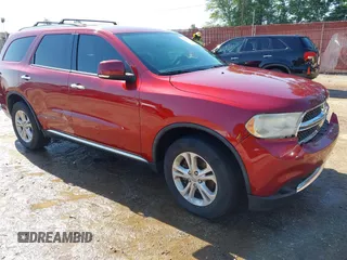 2013 Dodge Durango Crew z VIN 1C4RDJDG3DC666363, wystawiony jako IAAI lot #42250631 z przebiegiem 196 160 mil mil oraz . Historia ofert i sprzedaży dostępna na DreamBid. Obrazek 1.