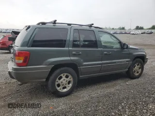 2002 Jeep Grand Cherokee z VIN 1J4GX38S72C152046, wystawiony jako Copart lot #57963095 z przebiegiem 204 576 mil mil oraz Szkoda całkowita • Salvage title. Historia ofert i sprzedaży dostępna na DreamBid. Obrazek 3.
