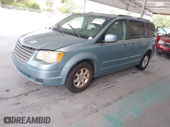 2009 Chrysler Town & Country Touring with VIN 2A8HR54119R584798, listed as a IAAI auction lot 42183484 with 174,871 mi miles and . Bid and sale history available at DreamBid. Image 2.