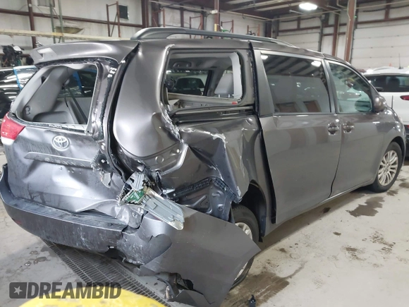 2013 Toyota Sienna XLE AAS with VIN 5TDYK3DC5DS355798, listed as a IAAI auction lot 41884055 with 135,032 mi miles. Bid and sale history available at carsss.com. Image 4.