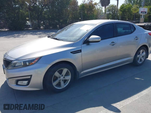 2014 Kia Optima LX with VIN KNAGM4A70E5482966, listed as a IAAI auction lot 42109539 with 194,519 mi miles and . Bid and sale history available at carsss.com. Image 2.