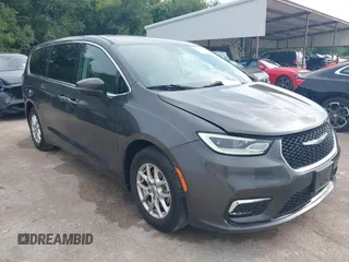 2023 Chrysler Pacifica Touring L with VIN 2C4RC1BG8PR594481, listed as a IAAI auction lot 42618839 with 60,748 mi miles and . Bid and sale history available at DreamBid. Image 1.