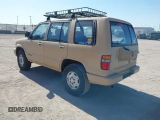1994 Isuzu Trooper z VIN JACDH58VXR7912645, wystawiony jako IAAI lot #42207513 z przebiegiem 321 148 mil mil oraz . Historia ofert i sprzedaży dostępna na DreamBid. Obrazek 3.