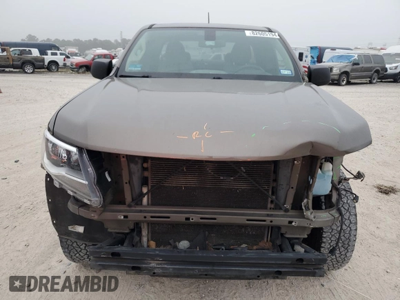 2015 Chevrolet Colorado z VIN 1GCHSAE33F1266105, wystawiony jako Copart lot #82605194 z przebiegiem 215 672 mil mil oraz Szkoda całkowita • Salvage title. Historia ofert i sprzedaży dostępna na DreamBid. Obrazek 5.