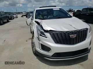 2021 Cadillac XT5 FWD Premium Luxury z VIN 1GYKNCR44MZ106982, wystawiony jako Copart lot #62234455 z przebiegiem 93 079 mil mil oraz Szkoda całkowita • Salvage title. Historia ofert i sprzedaży dostępna na DreamBid. Obrazek 14.