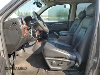2005 GMC Envoy SLT with VIN 1GKDS13S952382088, listed as a Copart auction lot 64765154 with 177,333 mi miles and Salvage Title. Bid and sale history available at carsss.com. Image 7.