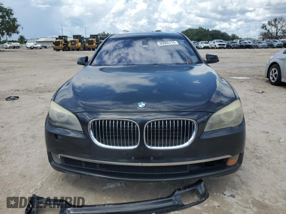2011 BMW 7 Series with VIN WBAKX8C57BC198326, listed as a Copart auction lot 69985174 with 142,353 mi miles and Clean title. Bid and sale history available at DreamBid. Image 5.