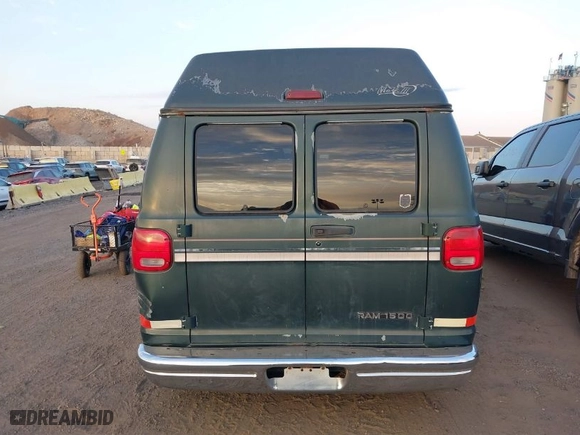 1999 Dodge Ram Van Conversion with VIN 2B6HB11Y8XK546999, listed as a IAAI auction lot 40672821 with NaN miles. Bid and sale history available at carsss.com. Image 16.